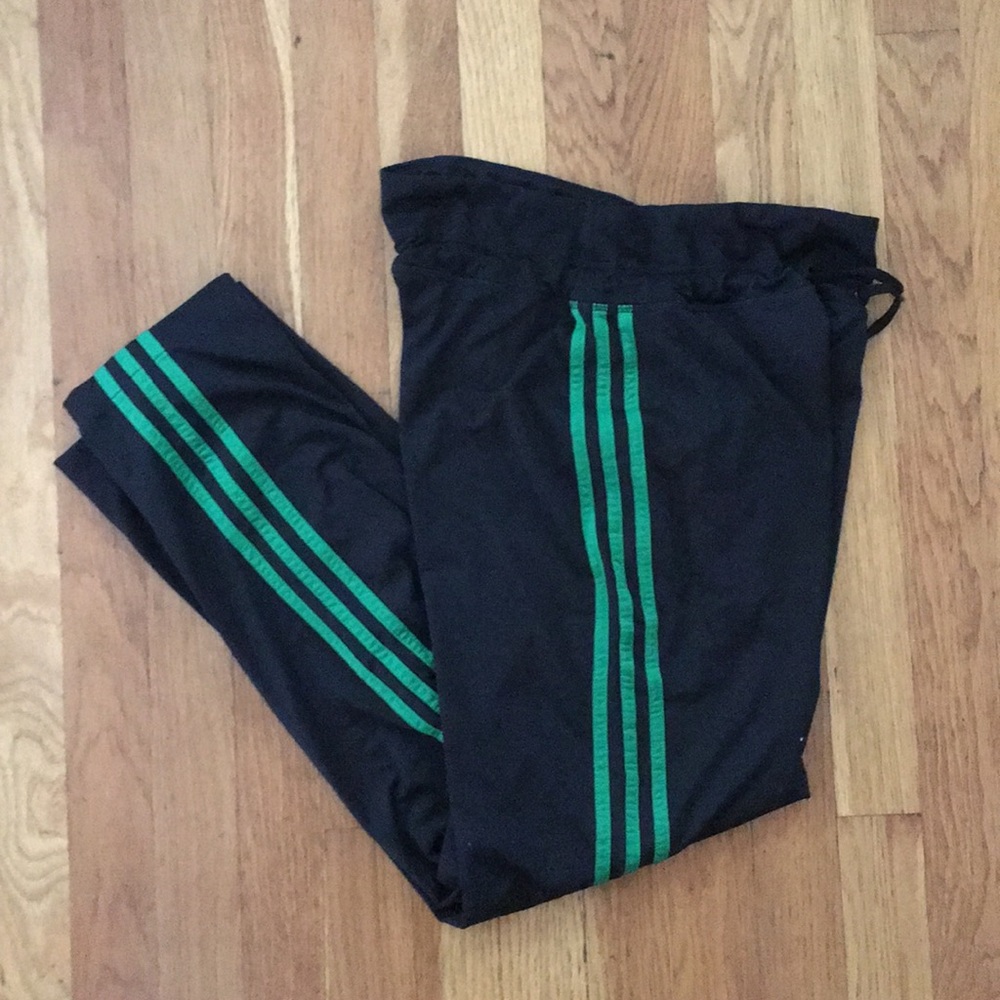Adidas track pants.